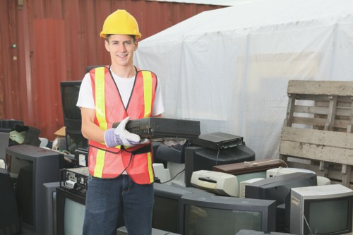 Professional team clearing home items in Islington